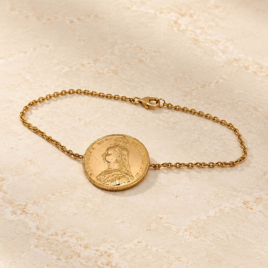 Bracelet chaîne avec pièce ronde dorée