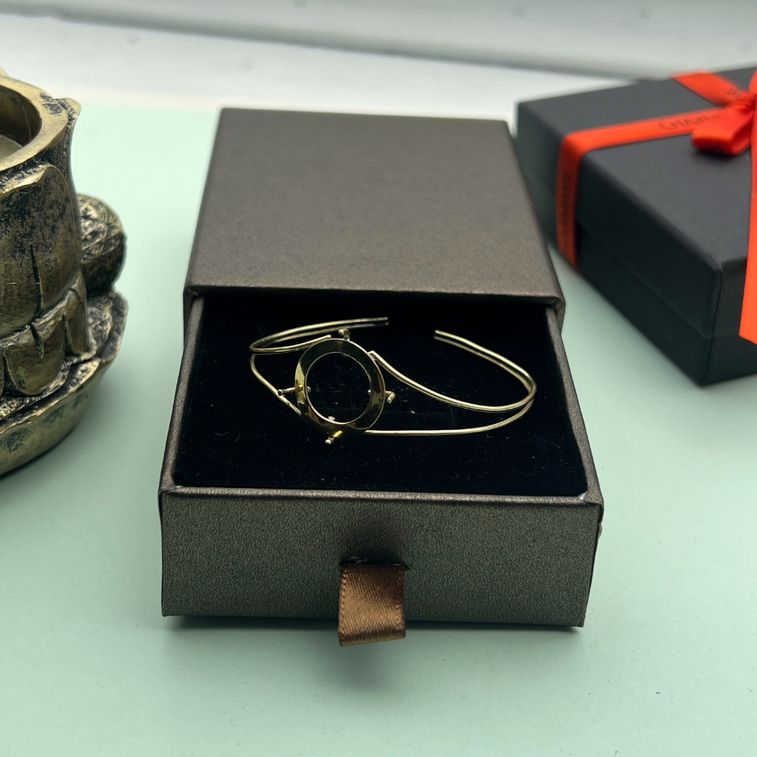 Bracelet jonc avec Pièce d'investissement 18/22 K