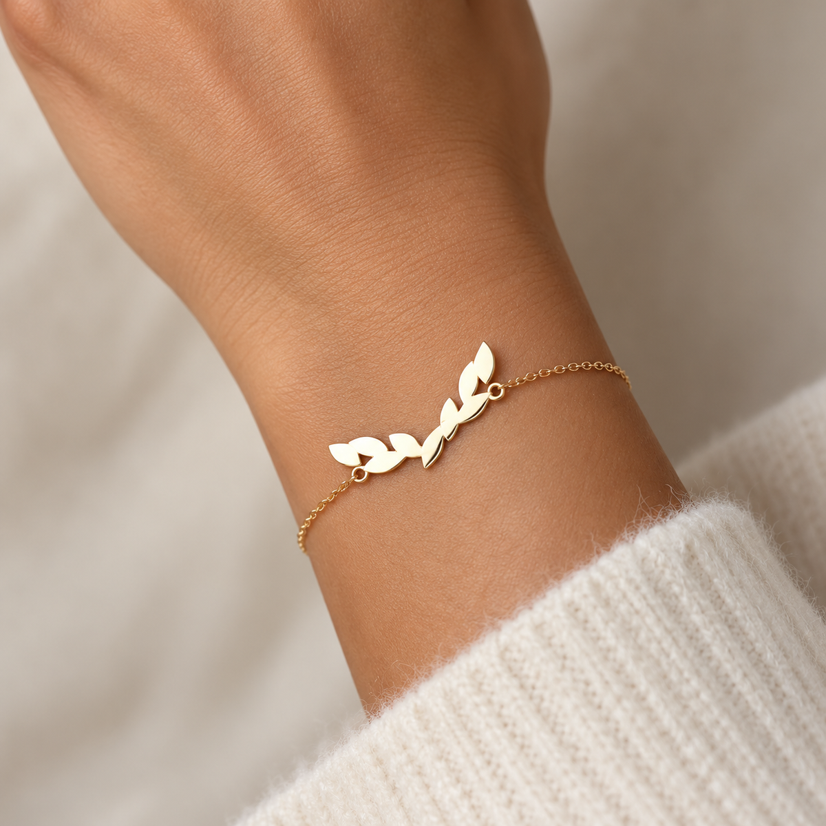 Bracelet à chaîne fine et motif central en Or