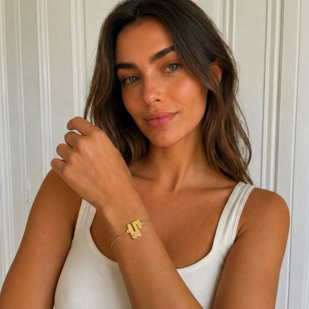 Mila – Bracelet chaîne fine symbole Or