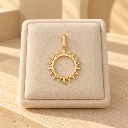 Pendentif doré soleil rayonnant