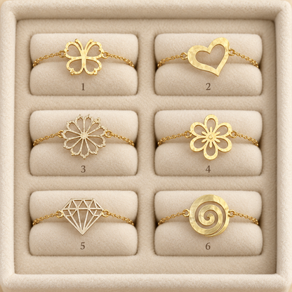 Assortiment de six bagues fines en Or à fleurs, cœur, trèfle et spirale