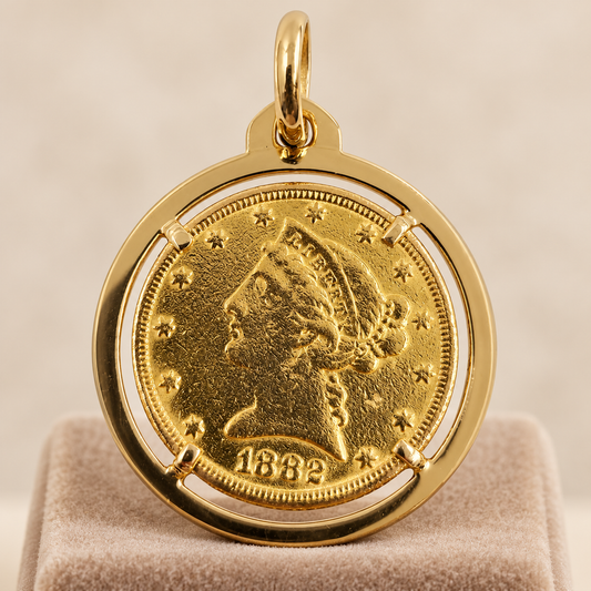 Pendentif pièce de monnaie ancienne sertie en or jaune 18 carats