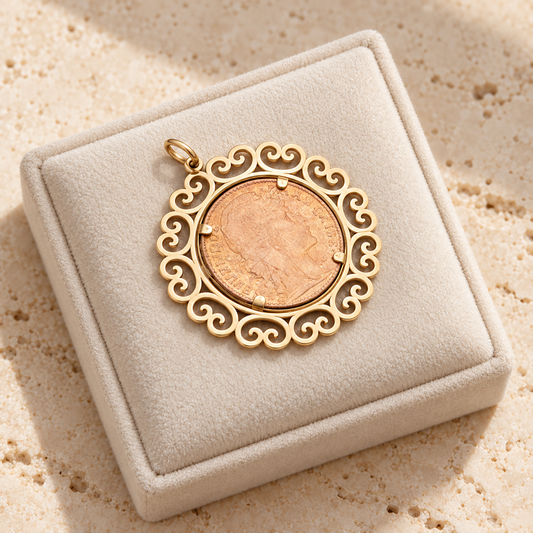 Pendentif porte-pièce bicolore à bordure de volutes
