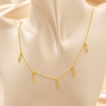 Collier doré à pendentifs rectangulaires ajourés