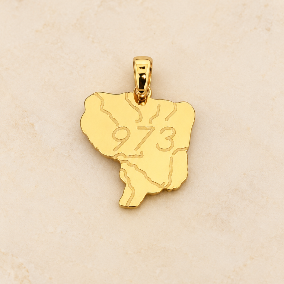 Pendentif carte géographique en or jaune