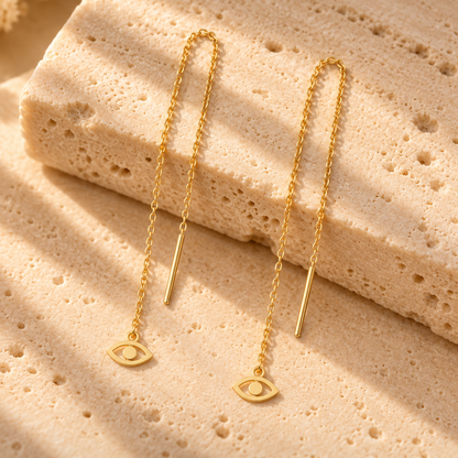 Boucles d’oreilles traversantes œil en or jaune 18K sur travertin, Charmays