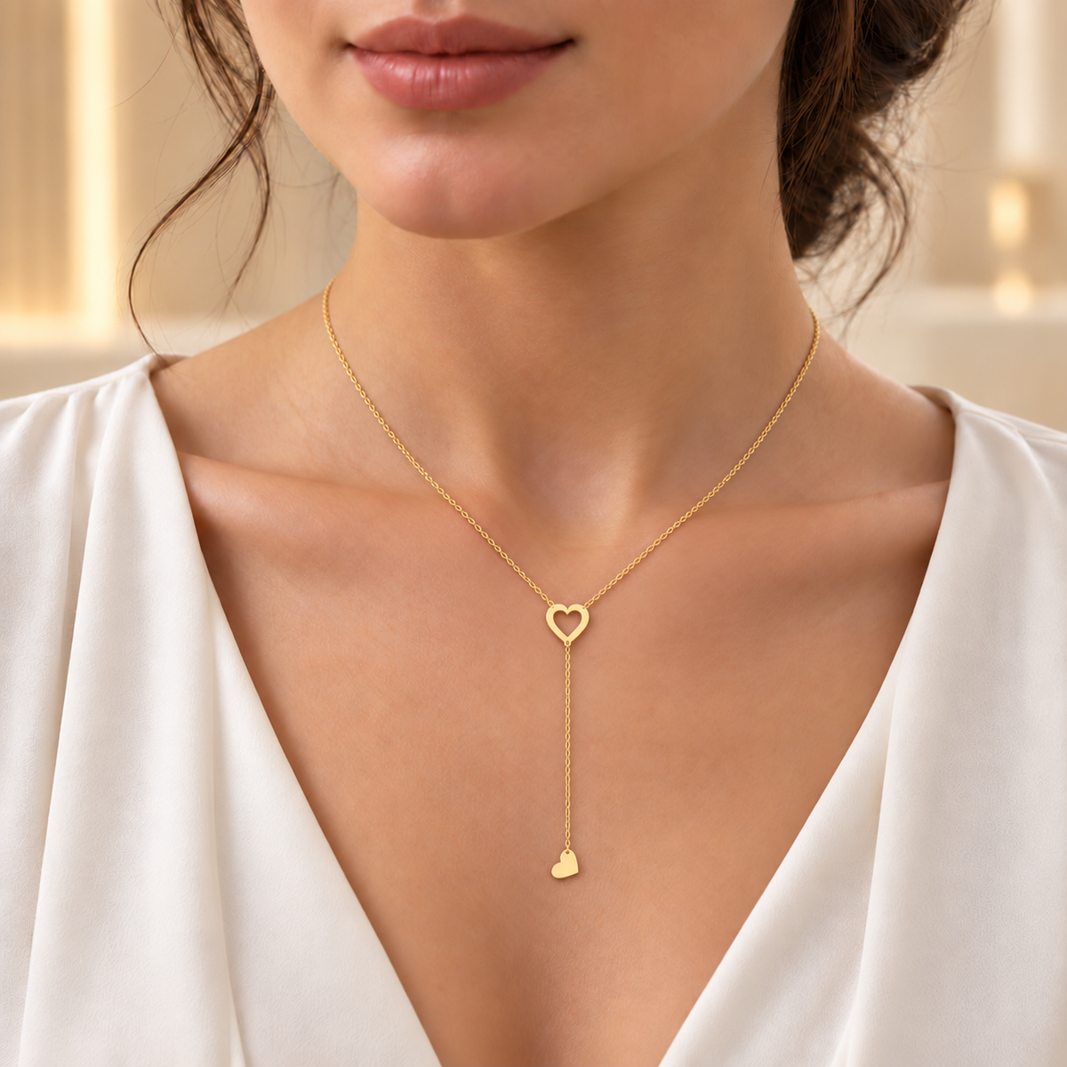 Collier doré en Y à cœur ajouré et petit cœur