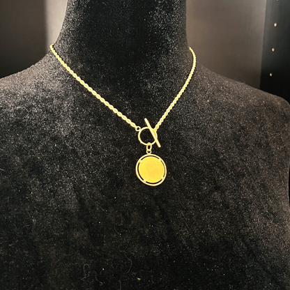 Collier Corde à bascule orné d'un Napoléon 10 Francs