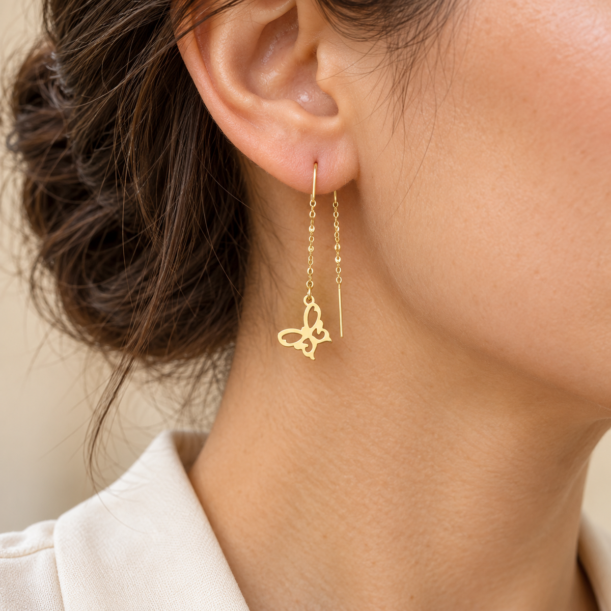 Boucles d’oreilles traversantes en Or  à papillons stylisés