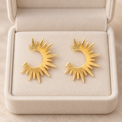 Boucle d’oreille en Or  à motif soleil rayonnant
